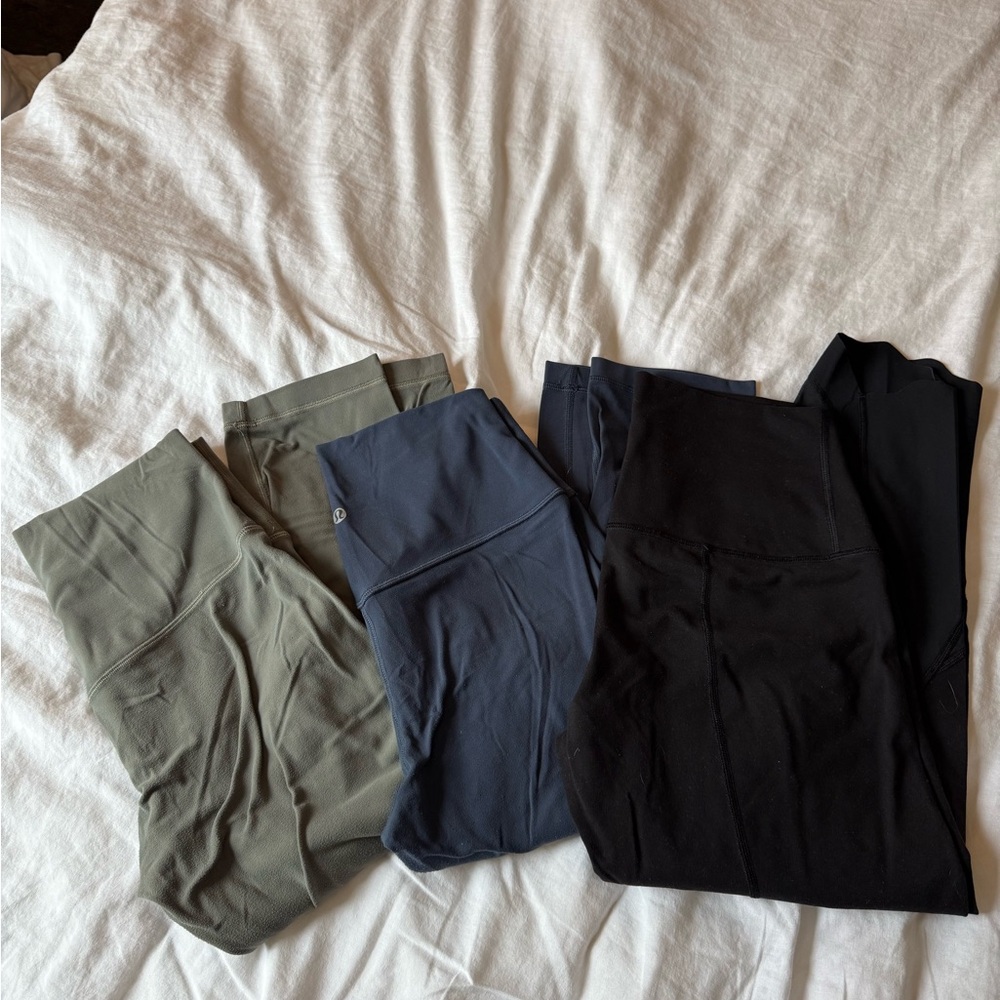 Set of 3 pairs of Lululemon Crop Leggings in Black, Blue, and Green